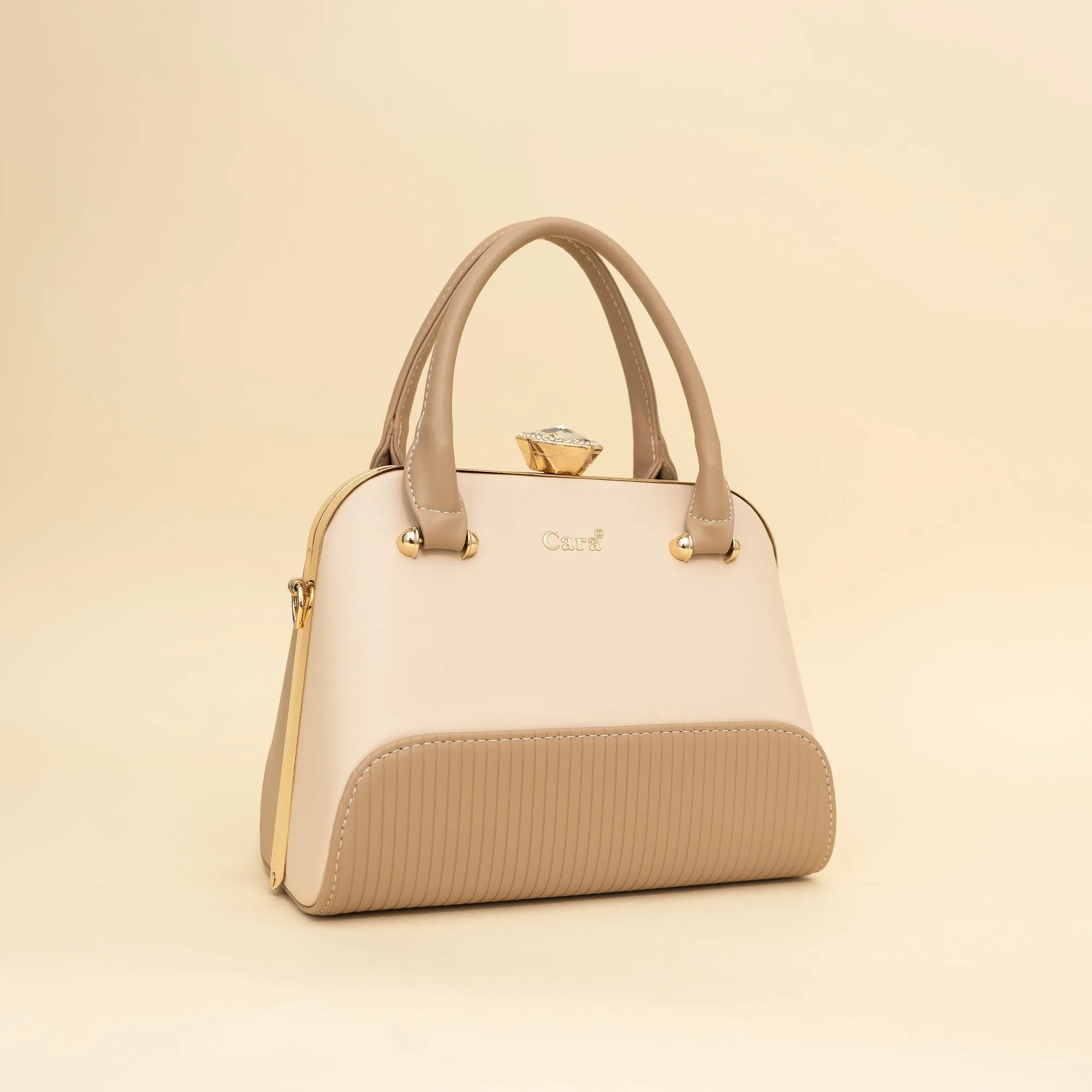 Cara's Glossy Glide satchel bag