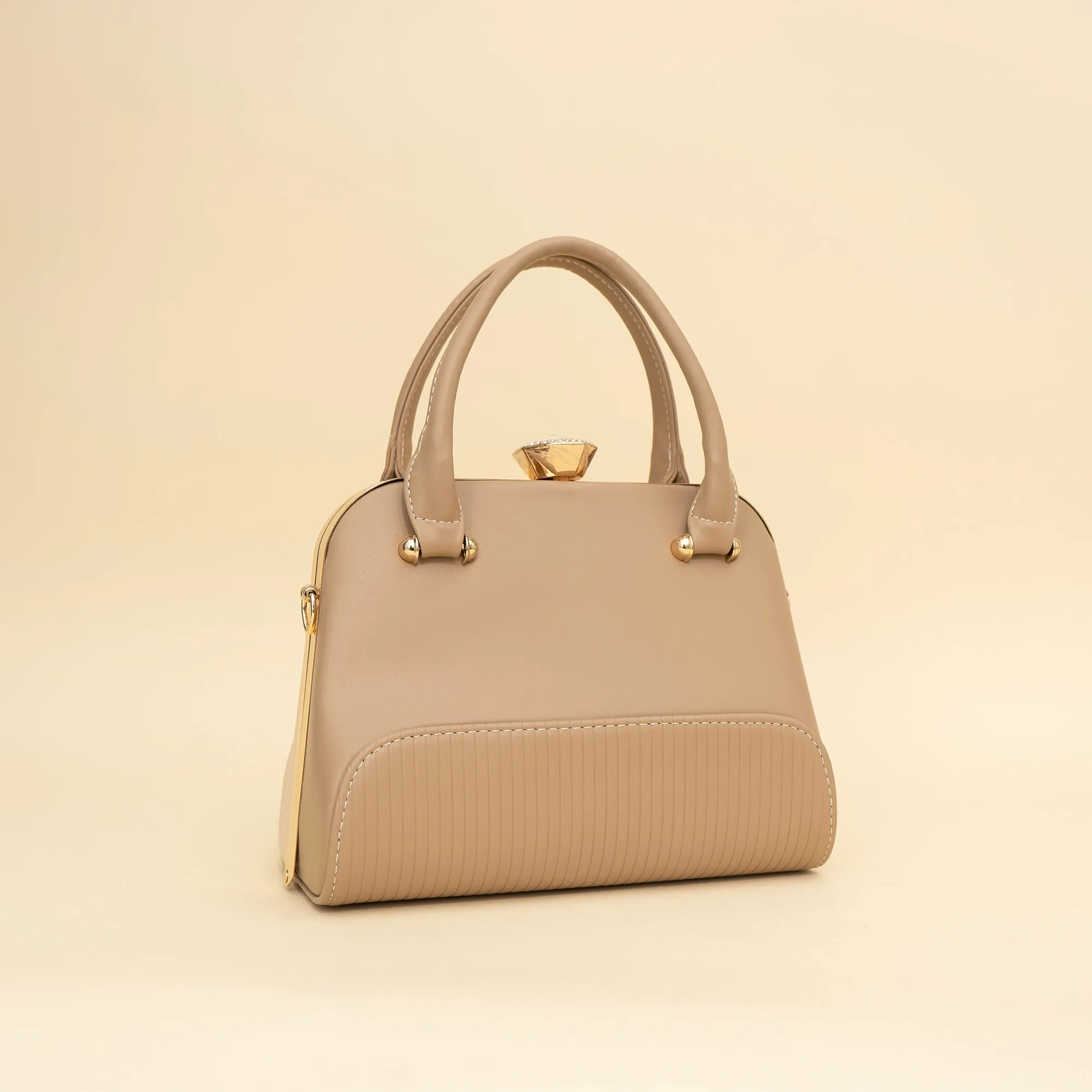 Cara's Glossy Glide satchel bag